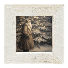 Santa near Lit Christmas Tree