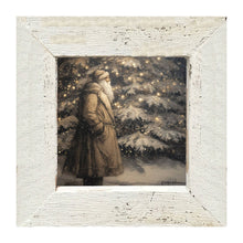 Santa near Lit Christmas Tree