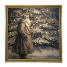 Santa near Lit Christmas Tree