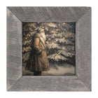 Santa near Lit Christmas Tree